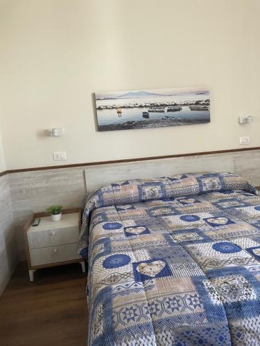 Ένα ή περισσότερα κρεβάτια σε δωμάτιο στο Hotel cappuccetto rosso