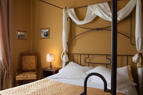 Postel nebo postele na pokoji v ubytování Al Borgo Rooms