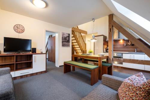 TV a/nebo společenská místnost v ubytování Apartment Felswelten
