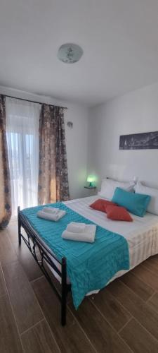 Ένα ή περισσότερα κρεβάτια σε δωμάτιο στο A&J Apartments
