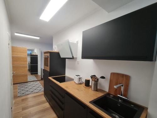 Kuchyň nebo kuchyňský kout v ubytování Zen Apartment - central - modern - kitchen - wifi