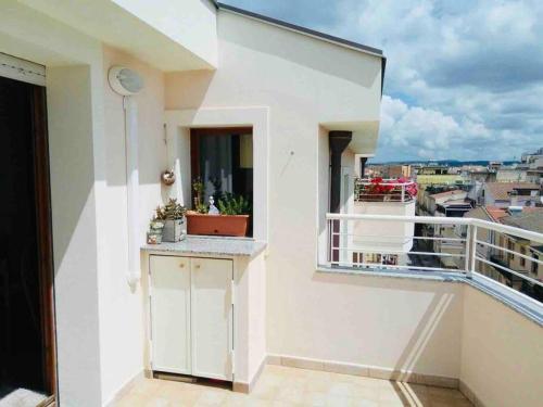 a balcony with a view of a city at Appartamento incantevole in centro città in Alghero