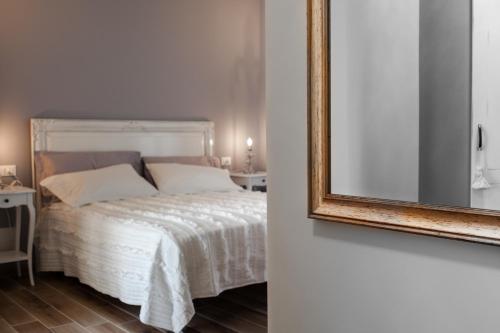 Katil atau katil-katil dalam bilik di Al Borgo Rooms