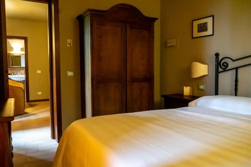 Uma cama ou camas num quarto em Chiesatonda Resort