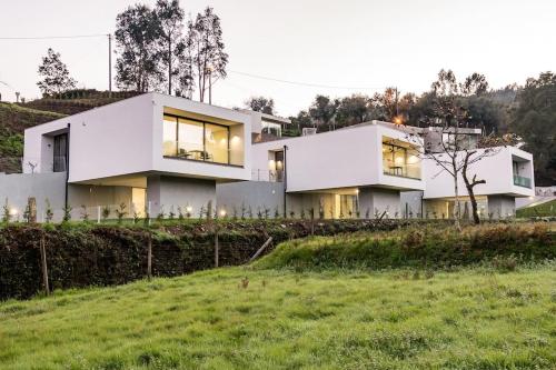 a white house on top of a hill at Viana do Castelo - Amonde Village -Casa A * Relax in Amonde