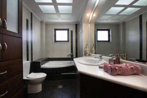 Kúpeľňa v ubytovaní Terpsis House