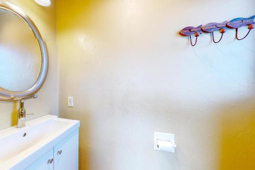 a bathroom with a sink and a mirror on the wall at The Canal Is Callin' in Union