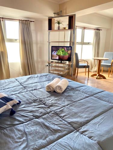 Hotel Atlántico Suitesにあるベッド
