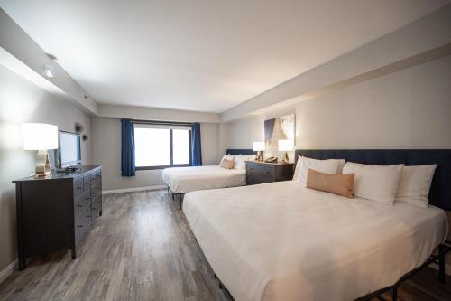 Ένα ή περισσότερα κρεβάτια σε δωμάτιο στο Stay Together Suites on The Strip - 2 Bedroom Condo 926