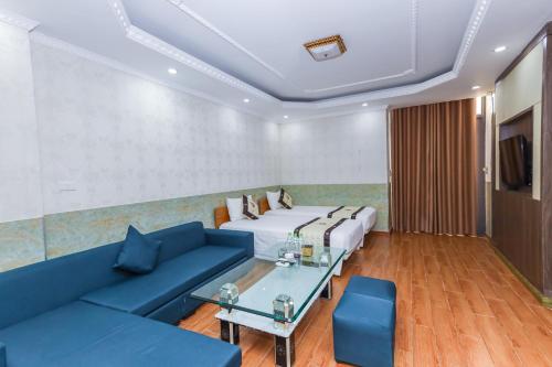 Χώρος καθιστικού στο Phuong Hoang Hotel