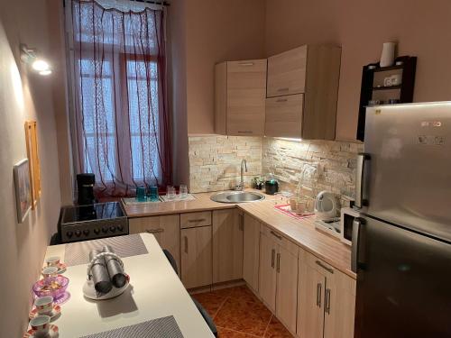 Kjøkken eller kjøkkenkrok på Budapest Clark Apartman **