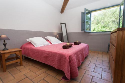 Posteľ alebo postele v izbe v ubytovaní Casa di l'olivu