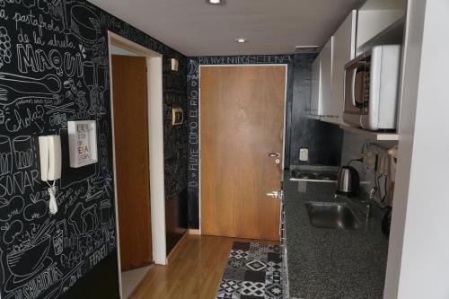Vonios kambarys apgyvendinimo įstaigoje Cerca de todo-cómodo y funcional
