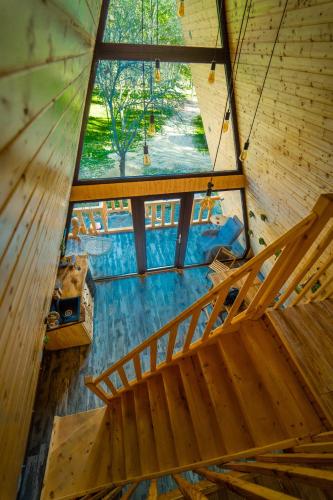 an overhead view of the inside of a tree house at Pensiunea Agroturistica Cerna, Vaideeni - Polovragi in Vaideeni