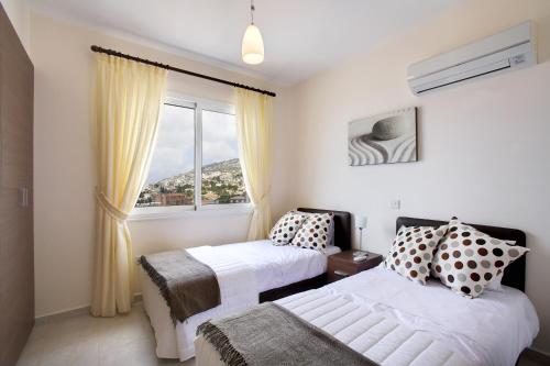 Postel nebo postele na pokoji v ubytování Chloraka Terrace Apartments