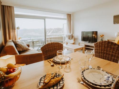 TV a/nebo společenská místnost v ubytování Studio Zeeduin by Interhome