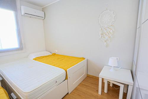 Postel nebo postele na pokoji v ubytování LITORAL COSTA DORADA - LAS TERRAZAS Only families