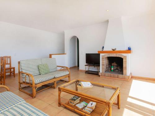 Televízia a/alebo spoločenská miestnosť v ubytovaní Holiday Home Garbinell II by Interhome