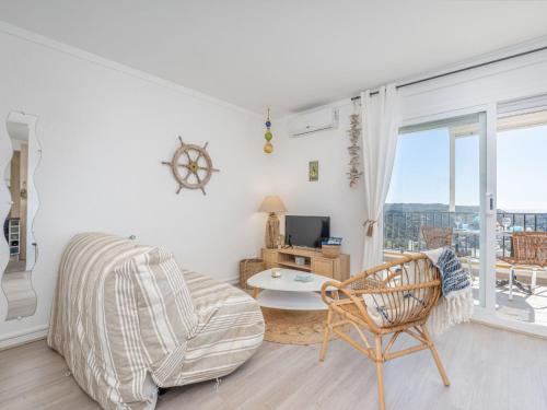 Televízia a/alebo spoločenská miestnosť v ubytovaní Apartment Casa Do by Interhome