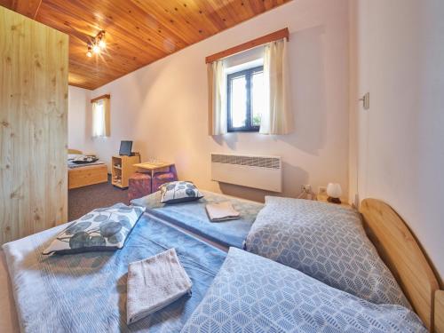 Katil atau katil-katil dalam bilik di Holiday Home Hodkovice by Interhome