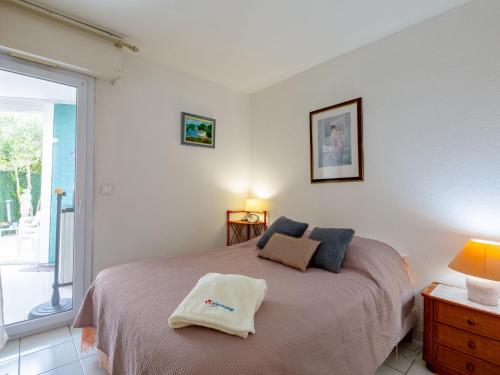 Posteľ alebo postele v izbe v ubytovaní Apartment Le chant de la mer by Interhome