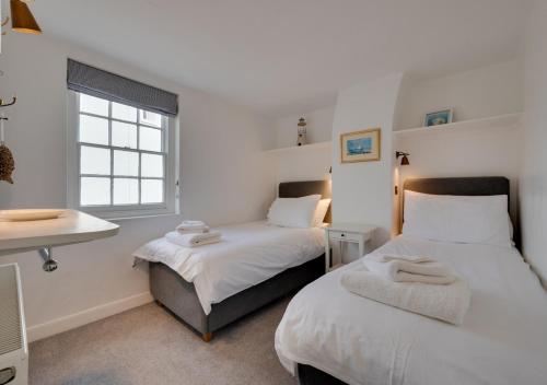 Postel nebo postele na pokoji v ubytování Shrimpers