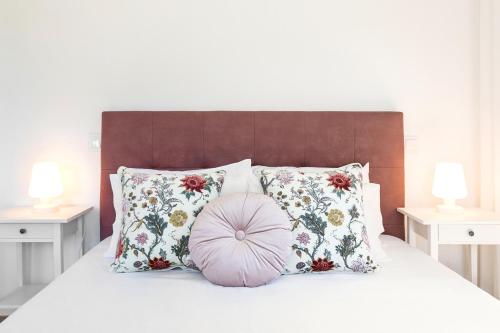 Un pat sau paturi într-o cameră la Maria da Vinha - Country House
