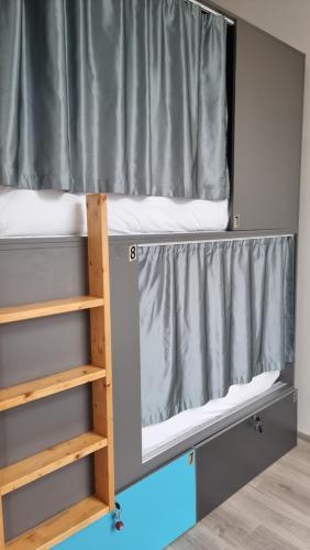 מיטה או מיטות בחדר ב-Freinest Wien