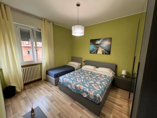 Ένα ή περισσότερα κρεβάτια σε δωμάτιο στο Orio EASY RELAX 24H Airport 2 - Top appartment