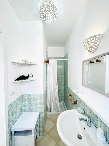a bathroom with a sink and a shower at Balconcino d'Oriente in Otranto