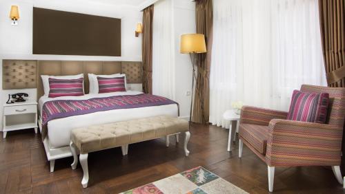 Cama o camas de una habitación en Astan Hotel Taksim