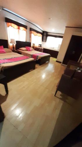 Ein Bett oder Betten in einem Zimmer der Unterkunft LEHNS MOTEL