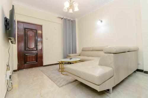 Televisyen dan/atau pusat hiburan di 2BR Luxury Apartment