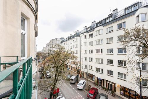 a view of a city street with buildings at Hoża 62 Apartment in Warsaw