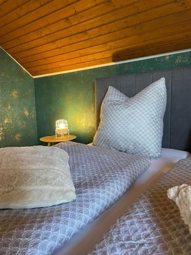 Ένα ή περισσότερα κρεβάτια σε δωμάτιο στο Ferienhaus Mone