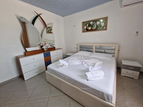 Giường trong phòng chung tại Villa Bani