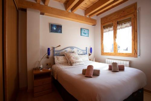 A bed or beds in a room at Apartamento con Encanto
