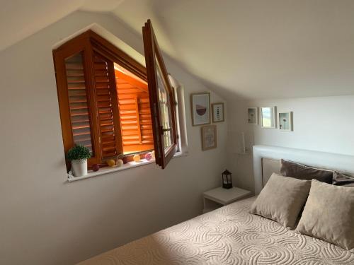 Postel nebo postele na pokoji v ubytování Vrnjački apartman