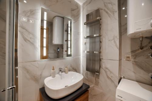 Koupelna v ubytování Apartman E.M.A