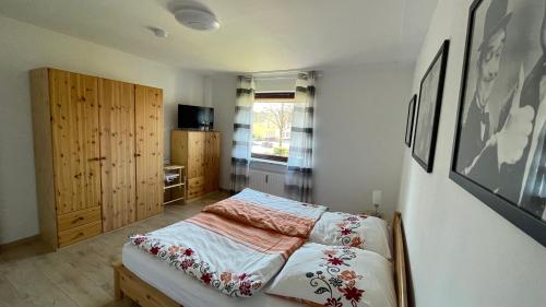 Postel nebo postele na pokoji v ubytování Ferienwohnung Nordlichter Bremerhaven