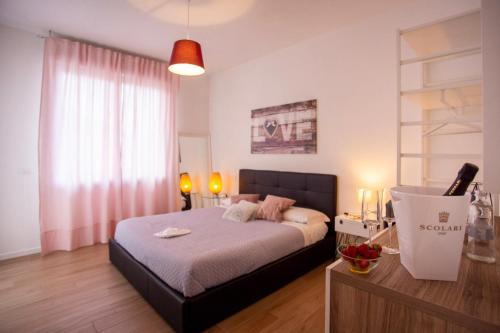 a bedroom with a bed in a room at Bed And Breakfast Castello7 in San Felice del Benaco