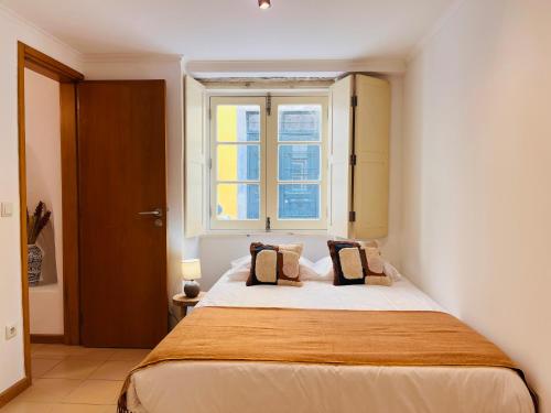 Postel nebo postele na pokoji v ubytování Alta apartments