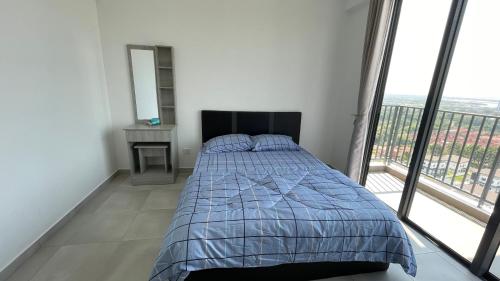a bedroom with a bed and a large window at Sandakan Homestay 3BedRoom 2Bath Joyful Cottage 喜悦小屋 For 5 guests in Sandakan