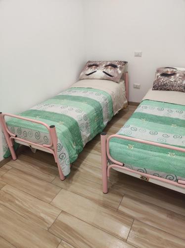Katil atau katil-katil dalam bilik di Giada's House
