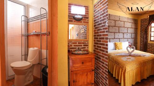 Un baño de Hotel y Cabañas Alan
