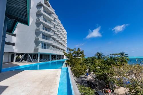 a view of the hotel from the pool at Grand Sirenis San Andres in San Andrés