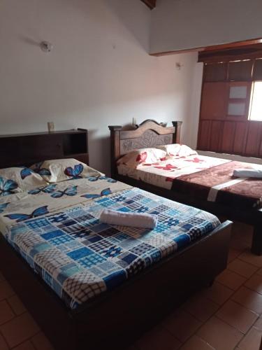 Postel nebo postele na pokoji v ubytování Casa Bautan