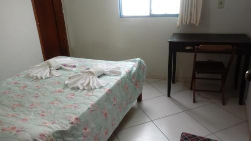 En eller flere senge i et værelse på Diamantina Ecohostel