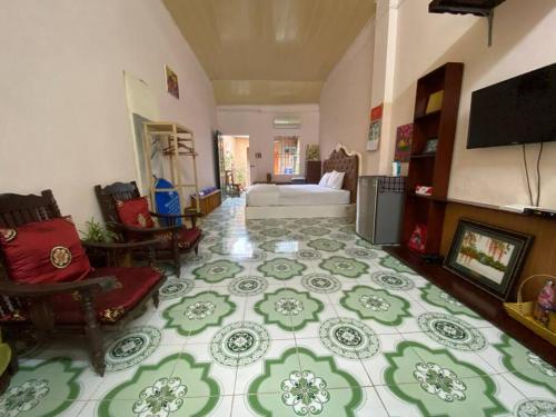 a living room with a couch and a living room with a floor at T30 Hanoi Homestay, near Lotte Tay Ho, 25minutes to the airport in Hanoi