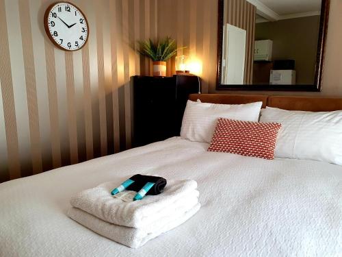 Un ou plusieurs lits dans un hébergement de l'établissement M2 West Perth Studio Apartment near Kings Park